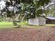 Spacious backyard with shed and large trees at 14468 Ne 204Th Ln, Fort Mc Coy, FL 32134