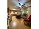 Kitchen with wood cabinets, flooring, and a dining area at 14468 Ne 204Th Ln, Fort Mc Coy, FL 32134