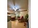 Open concept kitchen and living room with wood flooring at 14468 Ne 204Th Ln, Fort Mc Coy, FL 32134