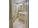 Bathroom with shower/tub combo, vanity, and patterned curtain at 14468 Ne 204Th Ln, Fort Mc Coy, FL 32134