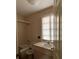 Clean bathroom with a shower/tub combo, toilet and vanity at 14468 Ne 204Th Ln, Fort Mc Coy, FL 32134