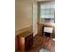 Small bedroom with wood floors and a window with blinds at 14468 Ne 204Th Ln, Fort Mc Coy, FL 32134