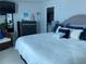 Spacious bedroom with king-size bed and dresser at 2625 S Atlantic Ave # 9Ne, Daytona Beach, FL 32118