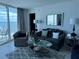Bright living room with ocean view and comfortable seating at 2625 S Atlantic Ave # 9Ne, Daytona Beach, FL 32118