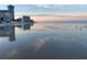Tranquil beach scene at sunset, with ocean reflections at 2625 S Atlantic Ave # 9Ne, Daytona Beach, FL 32118