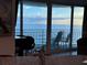 Stunning ocean view from condo balcony, featuring comfortable seating at 2625 S Atlantic Ave # 9Ne, Daytona Beach, FL 32118