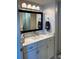 Modern bathroom with white vanity and quartz countertop at 2625 S Atlantic Ave # 9Ne, Daytona Beach, FL 32118