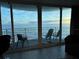 Breathtaking ocean view from condo balcony with comfortable seating at 2625 S Atlantic Ave # 9Ne, Daytona Beach, FL 32118