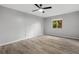 Spacious bedroom with wood-look floors and a large window at 600 Bahia Cir # A, Ocala, FL 34472