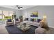 Living room with sofa, chairs and coffee table at 600 Bahia Cir # A, Ocala, FL 34472