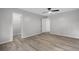 Second bedroom with ample closet space and wood-look floors at 600 Bahia Cir # A, Ocala, FL 34472
