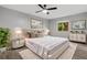 Main bedroom with a king-size bed and updated furnishings at 600 Bahia Cir # A, Ocala, FL 34472