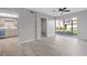 Spacious living room with sliding doors to patio at 600 Bahia Cir # A, Ocala, FL 34472