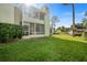 Condo building exterior with a well-manicured lawn at 600 Bahia Cir # A, Ocala, FL 34472