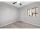 Third bedroom with wood-look floors and a private door at 600 Bahia Cir # A, Ocala, FL 34472