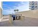 Outdoor grilling area with ocean views at 89 S Atlantic Ave # 204, Ormond Beach, FL 32176