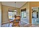 Casual dining area with a round table and chairs, and access to the lanai at 3290 Se 53Rd Ct, Ocala, FL 34480