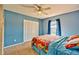 Bedroom with double-door closet and window view at 3290 Se 53Rd Ct, Ocala, FL 34480