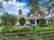Home's back with a fenced yard at 9573 Sw 53Rd Cir, Ocala, FL 34476