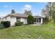 Backyard with patio and screened enclosure at 9573 Sw 53Rd Cir, Ocala, FL 34476