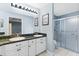 Bathroom boasts double sinks, granite countertops, and shower at 9573 Sw 53Rd Cir, Ocala, FL 34476