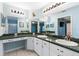 Double vanity bathroom with granite countertops and shower at 9573 Sw 53Rd Cir, Ocala, FL 34476