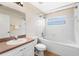 Clean bathroom with tub, toilet and vanity at 9573 Sw 53Rd Cir, Ocala, FL 34476
