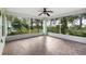 Spacious screened patio overlooking backyard at 9573 Sw 53Rd Cir, Ocala, FL 34476