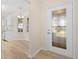 Bright entryway with view of kitchen and glass door at 8360 Sw 65Th Ave, Ocala, FL 34476