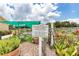 Herb and vegetable garden with community signage at 16465 Sw 14Th Ave, Ocala, FL 34473