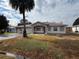 One-story house with a two-car garage and mature landscaping at 9981 Sw 59Th Cir, Ocala, FL 34476