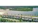 Aerial view of waterfront property, showcasing multiple units and lush landscaping at 14 Ocean Palm Villa S # 14, Flagler Beach, FL 32136