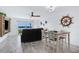 Bright dining area with water views and a wood table at 14 Ocean Palm Villa S # 14, Flagler Beach, FL 32136