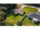 Two houses with fenced yards, viewed from above at 13589 Se 100Th Ave, Belleview, FL 34420