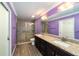 Bathroom features granite countertops, dual sinks, and a shower at 13589 Se 100Th Ave, Belleview, FL 34420