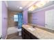 Clean bathroom with granite vanity and walk-in shower at 13589 Se 100Th Ave, Belleview, FL 34420