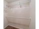 Spacious closet with wire shelving and hanging rod at 13589 Se 100Th Ave, Belleview, FL 34420