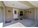 Inviting front porch with decorative accents and a bench at 13589 Se 100Th Ave, Belleview, FL 34420