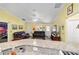 Bright living room with comfortable seating and access to the backyard at 13589 Se 100Th Ave, Belleview, FL 34420