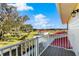 Private balcony overlooking a sprawling backyard and countryside views at 20690 Sw 36Th St, Dunnellon, FL 34431