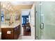 Modern bathroom with a glass shower and dark wood vanity at 20690 Sw 36Th St, Dunnellon, FL 34431