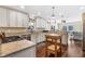 Large kitchen with center island and wood flooring at 20690 Sw 36Th St, Dunnellon, FL 34431