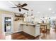 Bright kitchen with island and access to backyard at 20690 Sw 36Th St, Dunnellon, FL 34431