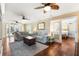Bright and airy living room with hardwood floors and access to a bedroom at 20690 Sw 36Th St, Dunnellon, FL 34431