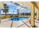Inviting kidney-shaped pool with a screened enclosure and open views at 20690 Sw 36Th St, Dunnellon, FL 34431