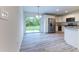 Kitchen dining area with sliding glass doors to backyard at 8873 Sw 139Th Place Rd, Ocala, FL 34473