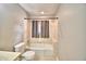 Bathroom with tub, toilet, and vanity at 103 13Th Se St, Winter Haven, FL 33880