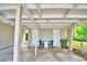 Covered carport with two doors and space for parking at 103 13Th Se St, Winter Haven, FL 33880