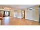 Bright living room with tile floors and a view to the kitchen at 103 13Th Se St, Winter Haven, FL 33880