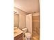 Clean bathroom with walk-in shower and single sink vanity at 103 13Th Se St, Winter Haven, FL 33880